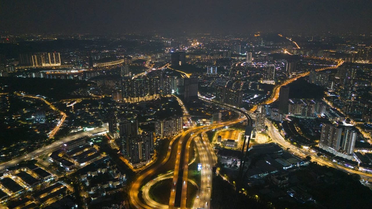 The Taman Desa corridor and its highways at night, seen from the air